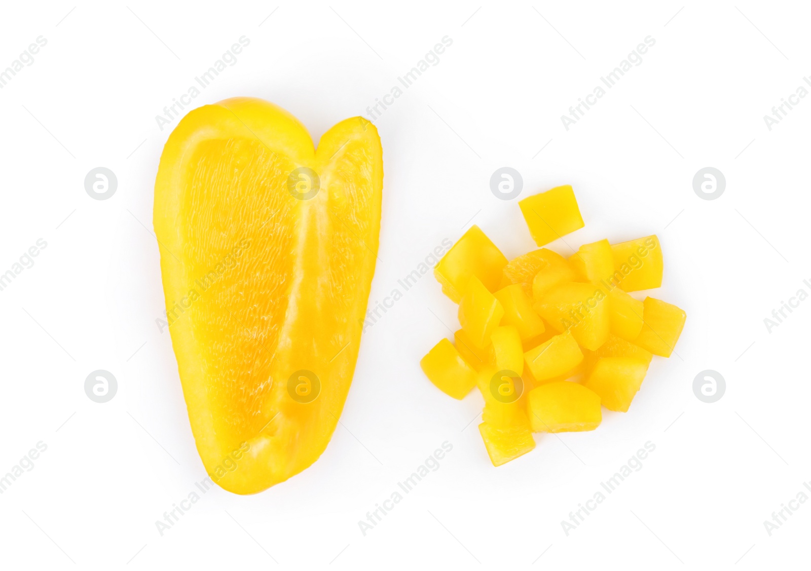 Photo of Cut yellow bell pepper isolated on white, top view