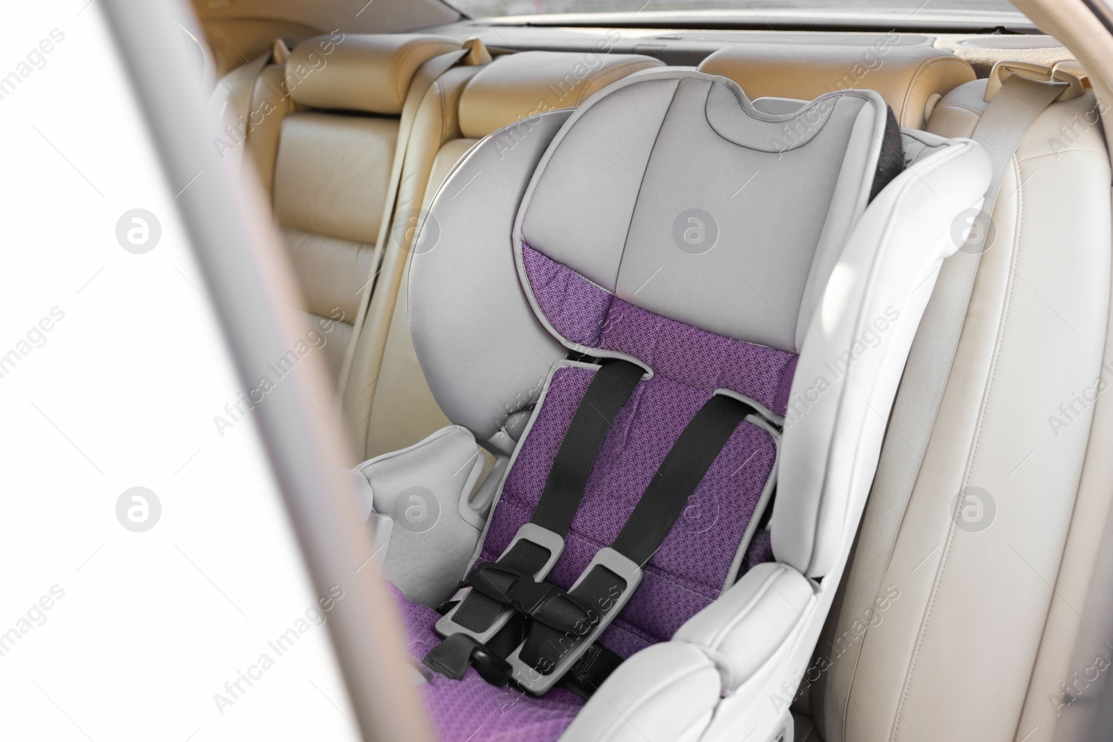 Photo of Empty modern child safety seat inside car