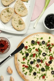 Photo of Flat lay composition with fresh butter board and bread on white marble table