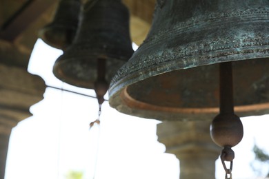 Closeup view of old bells in tower, space for text