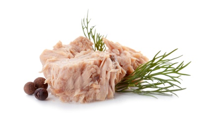 Delicious canned tuna chunks on white background