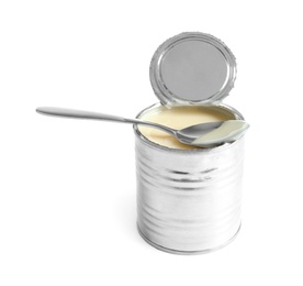 Photo of Tin can with condensed milk and spoon on white background. Dairy product