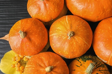 Photo of Many orange pumpkins as background, closeup. Autumn holidays