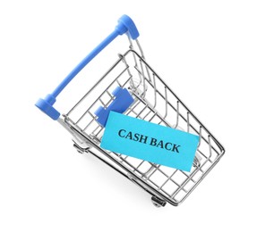 Photo of Card with word Cashback in shopping cart isolated on white, top view