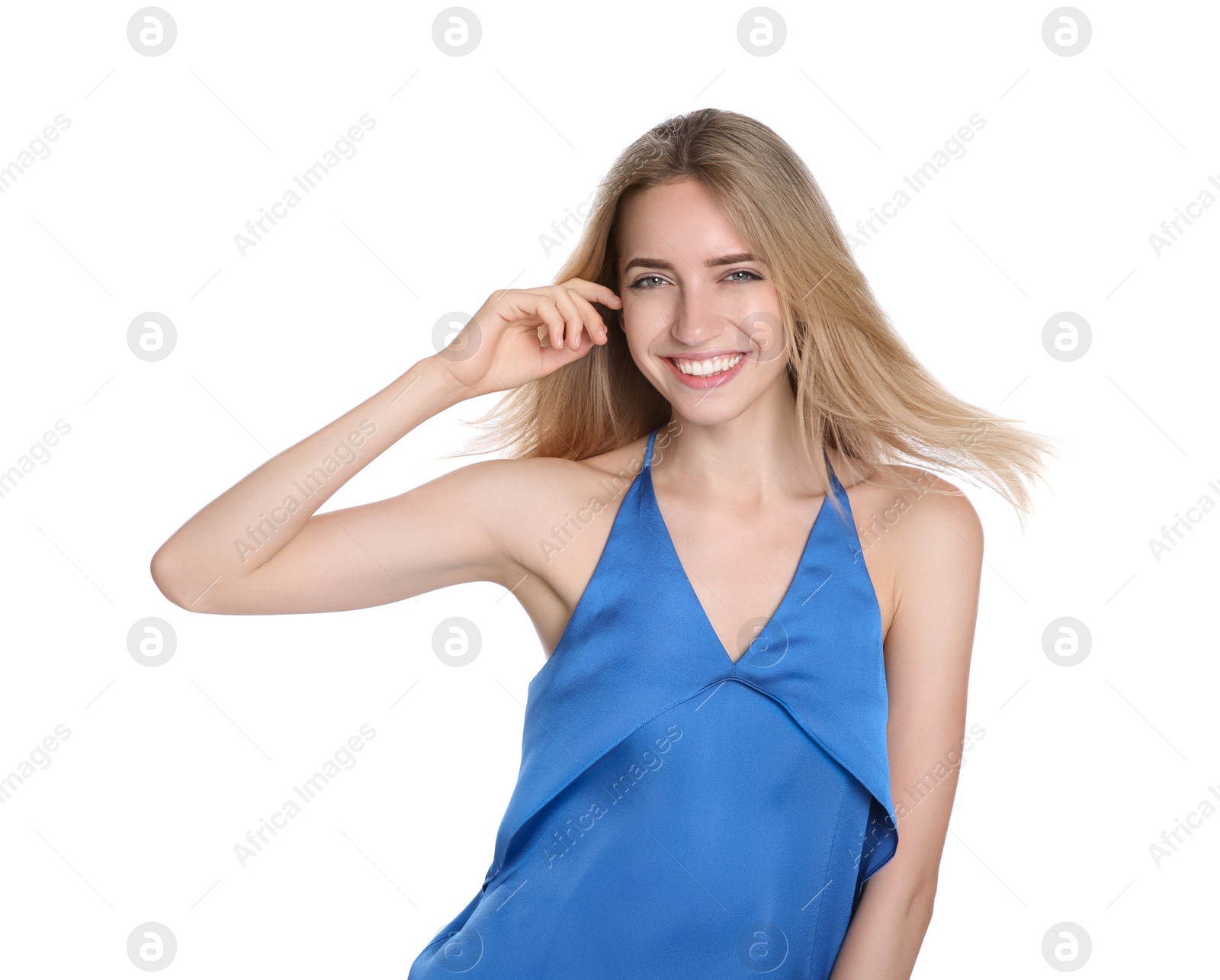 Photo of Portrait of beautiful young woman with blonde hair on white background