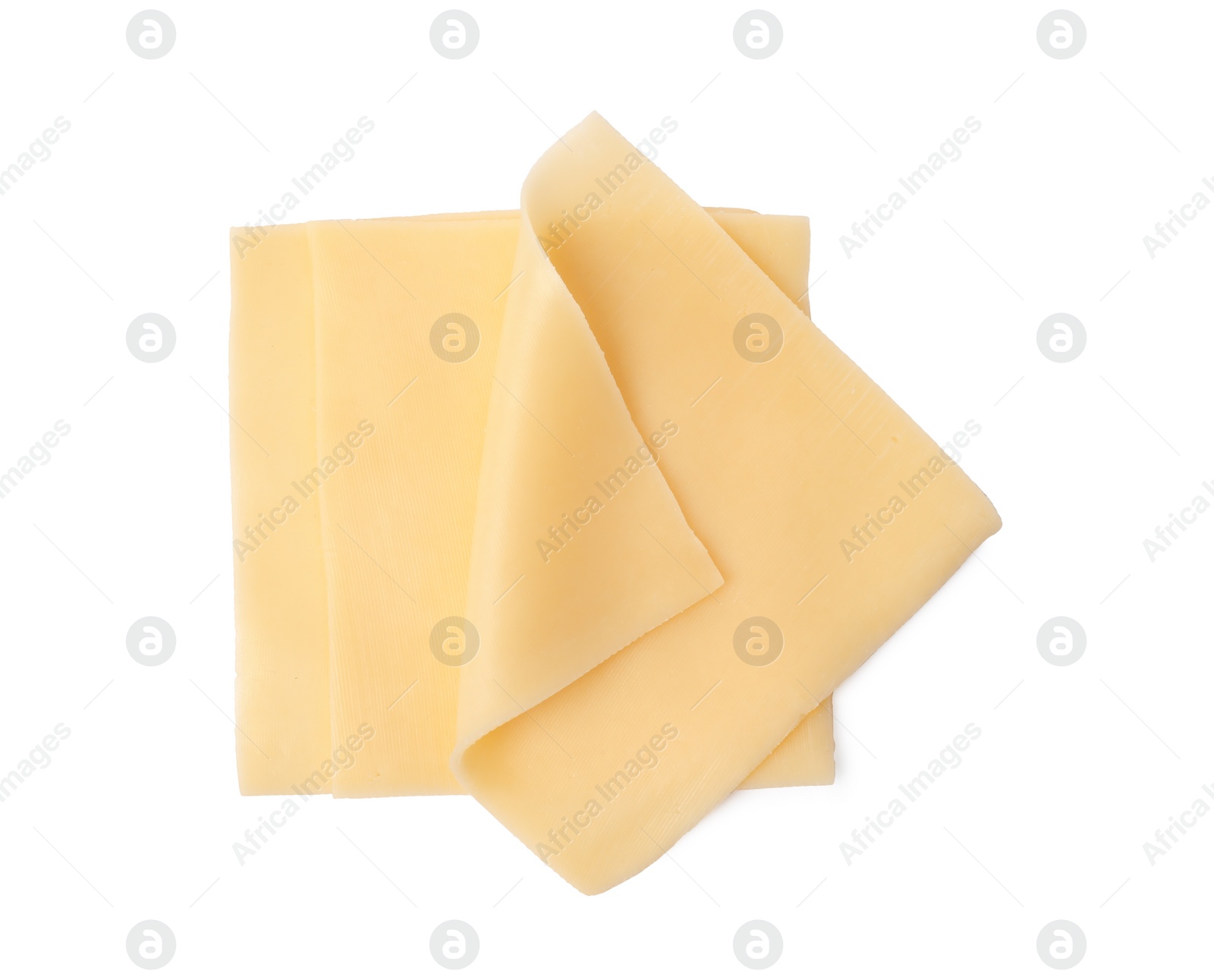 Photo of Slices of tasty fresh cheese isolated on white, top view