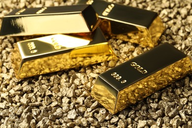 Many gold ingots on nuggets, closeup view