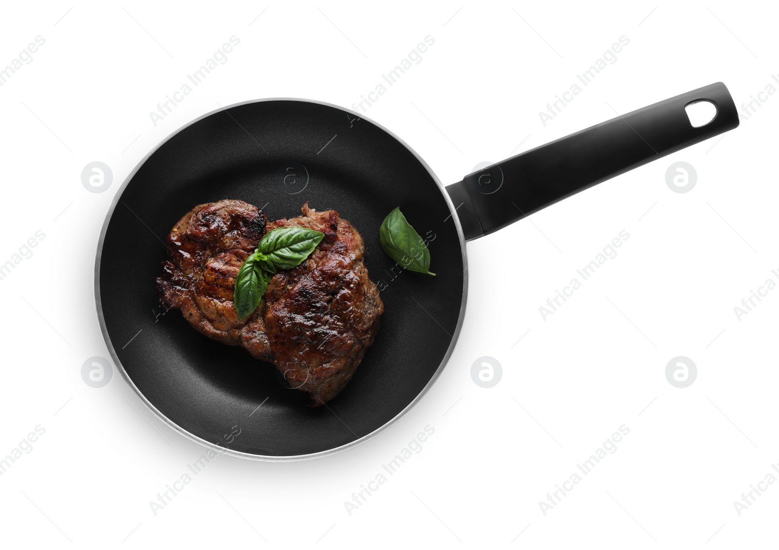 Photo of Tasty fried steak in pan isolated on white, top view