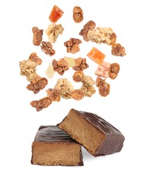Image of Tasty chocolate glazed protein bars and granola with dried fruits falling on white background