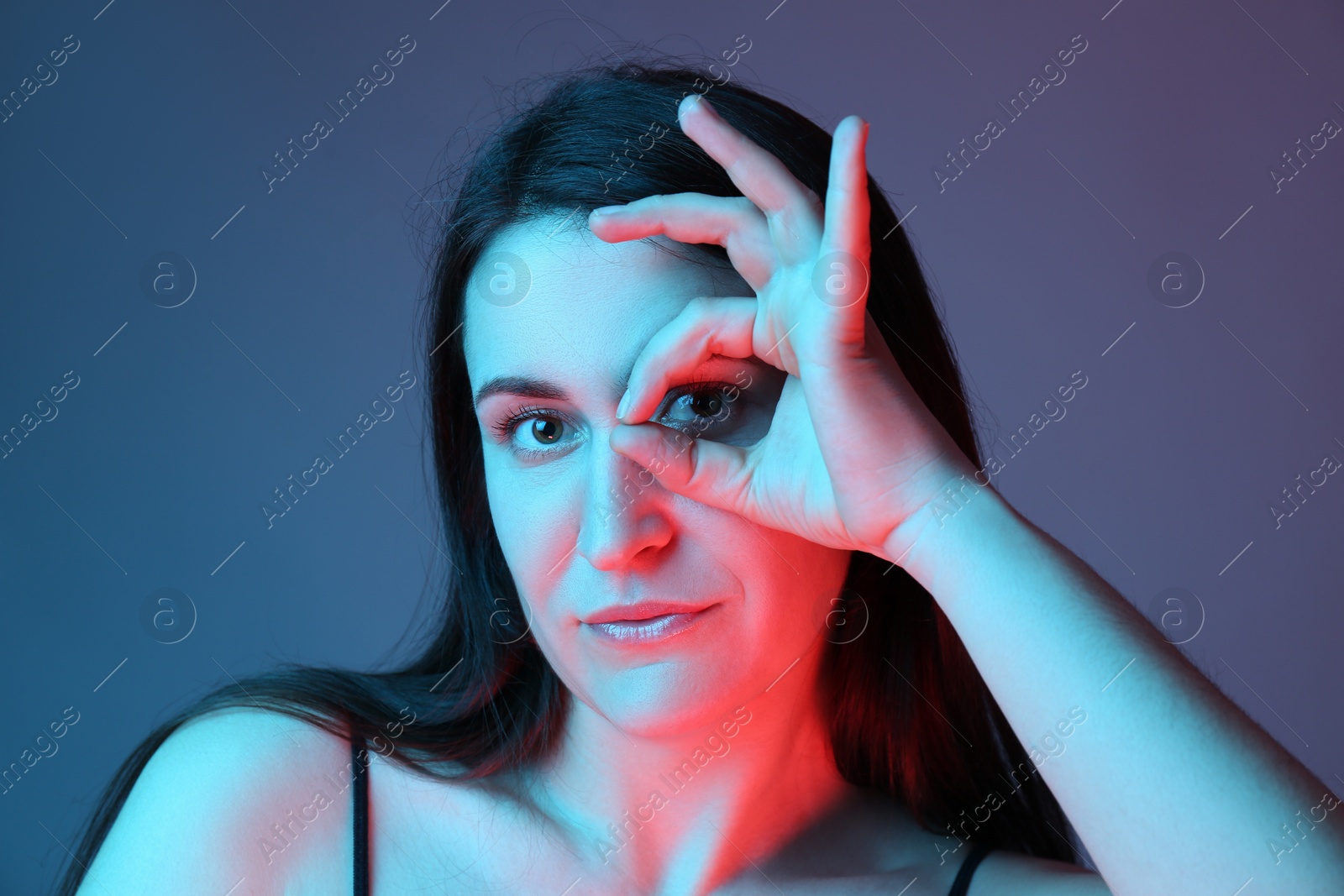 Photo of Portrait of beautiful young woman on color background