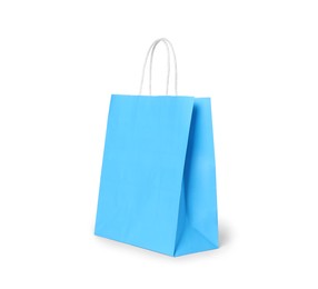Photo of Light blue gift paper bag on white background