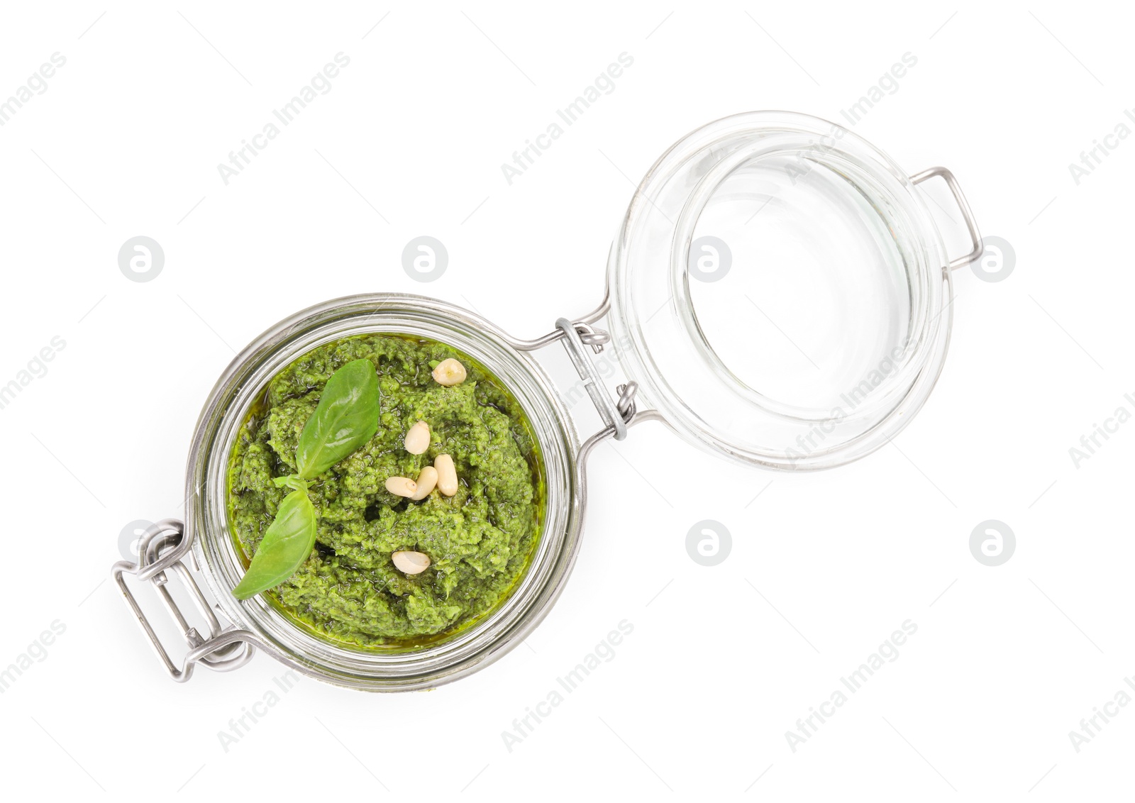 Photo of Fresh tasty pesto sauce isolated on white, top view