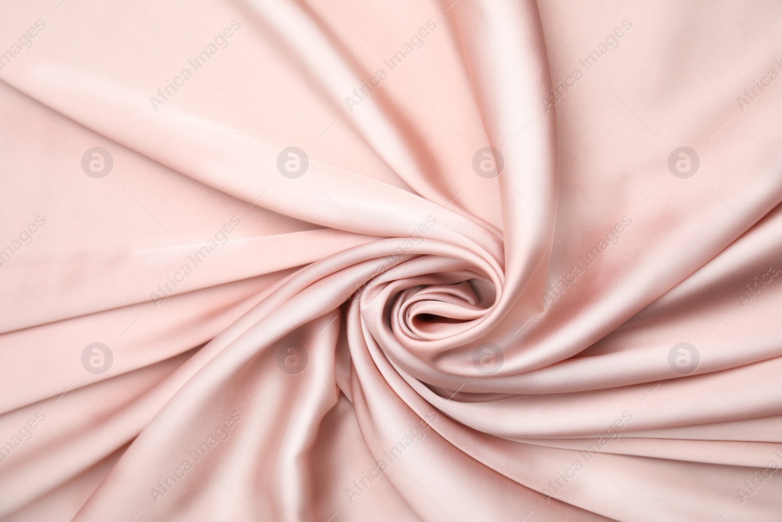 Photo of Texture of delicate pink silk as background, top view