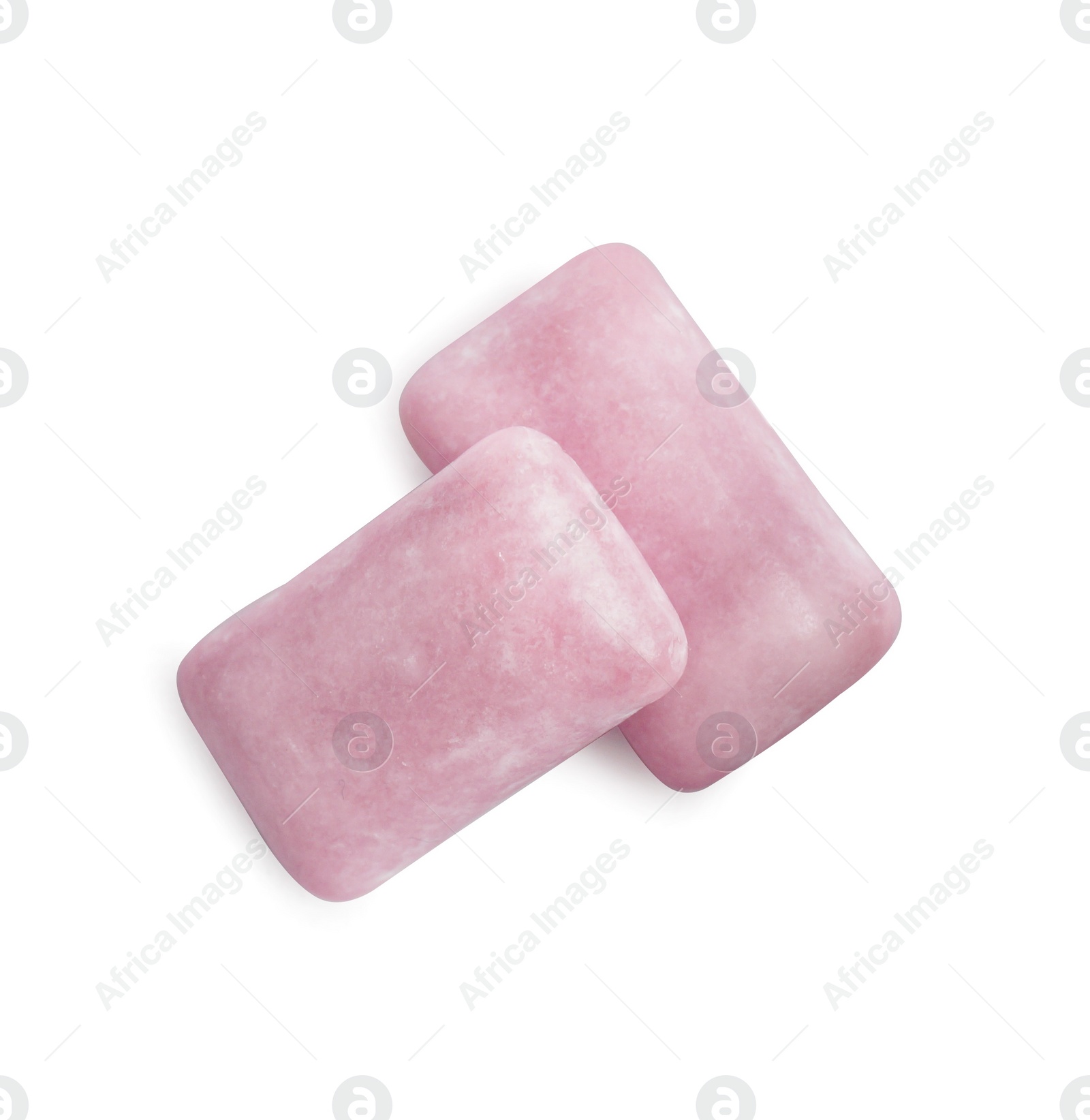 Photo of Tasty sweet chewing gums on white background, top view