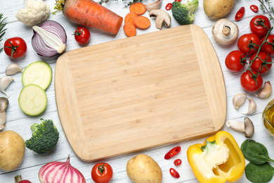 Photo of Flat lay composition with fresh products on white wooden table, space for text. Healthy cooking