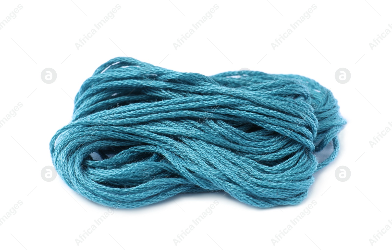 Photo of Light blue embroidery thread on white background