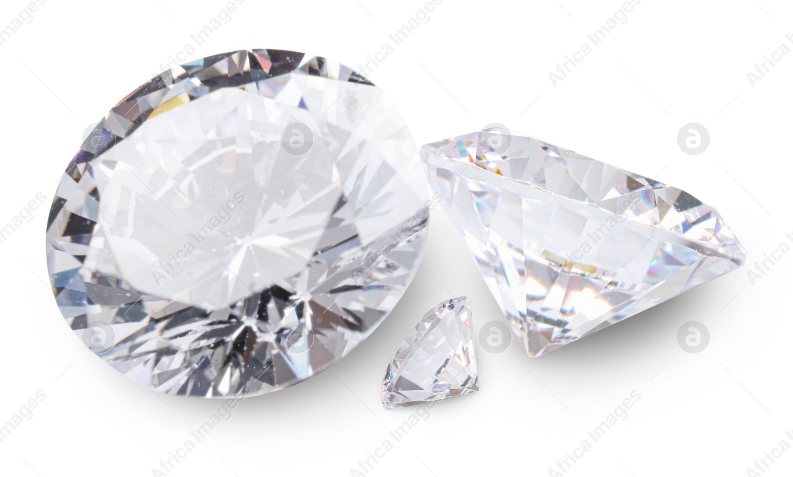 Image of Three beautiful dazzling diamonds on white background