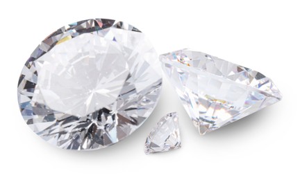 Image of Three beautiful dazzling diamonds on white background