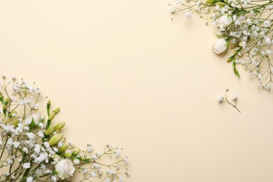 Photo of Beautiful floral composition with gypsophila on beige background, flat lay. Space for text
