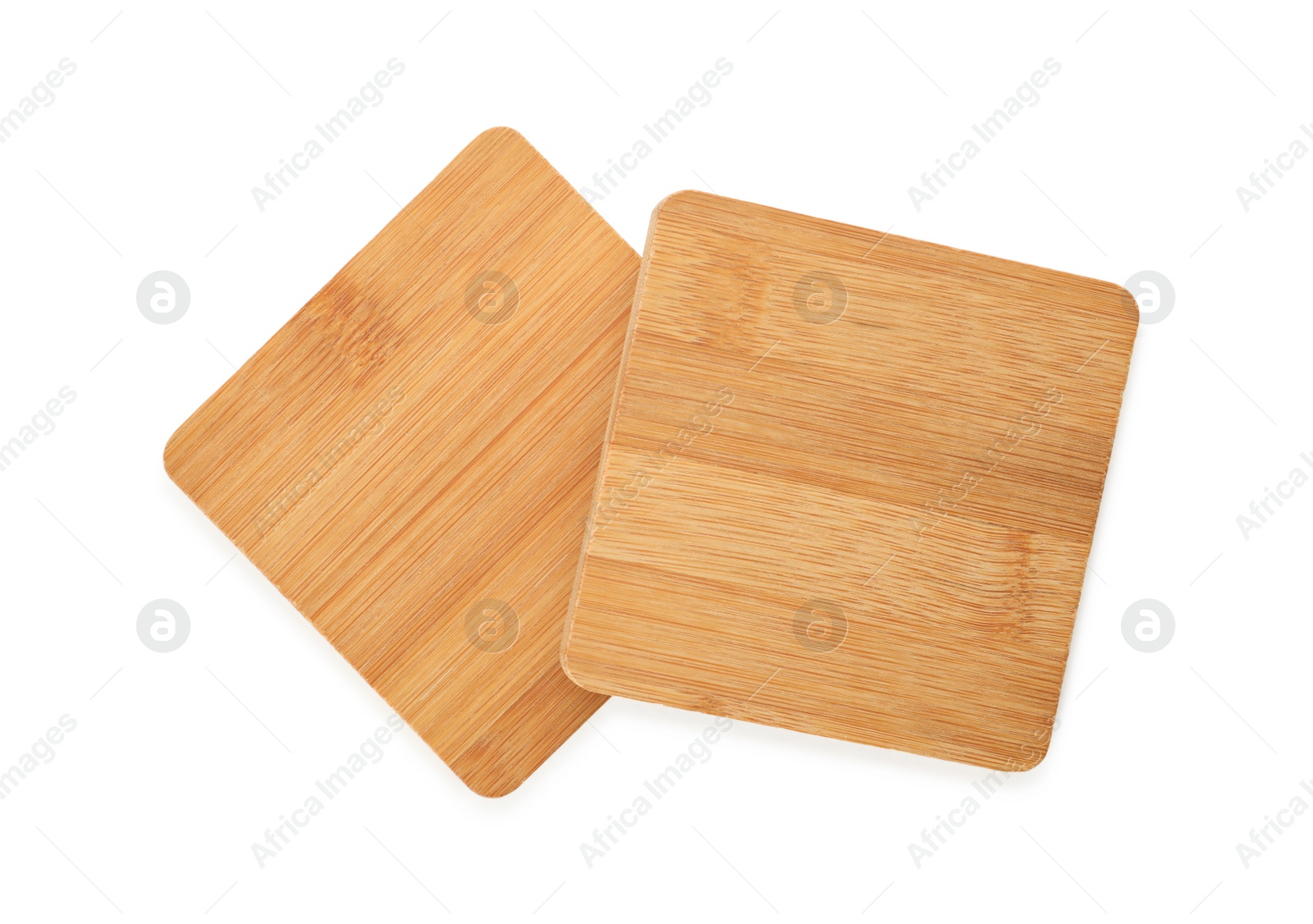 Photo of Wooden cup coasters on white background, top view