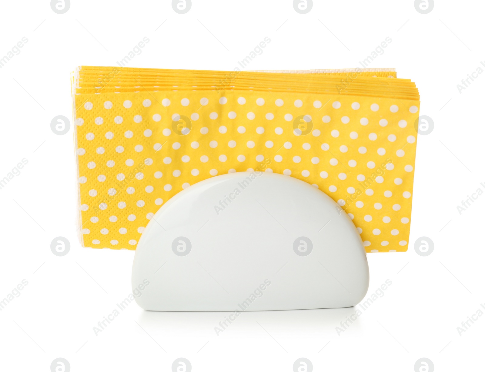 Photo of Ceramic napkin holder with paper serviettes on white background