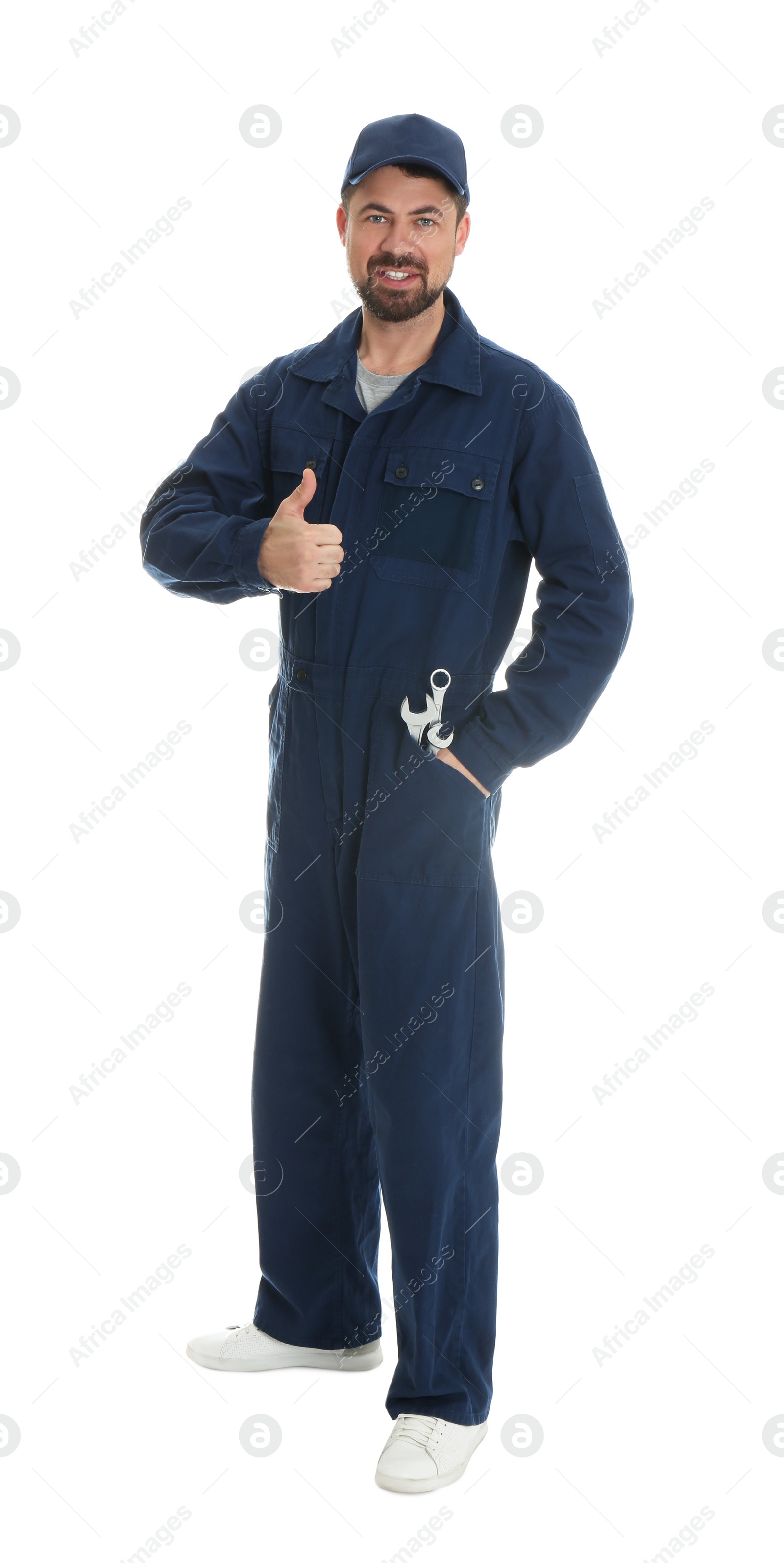 Photo of Full length portrait of professional auto mechanic with wrenches on white background