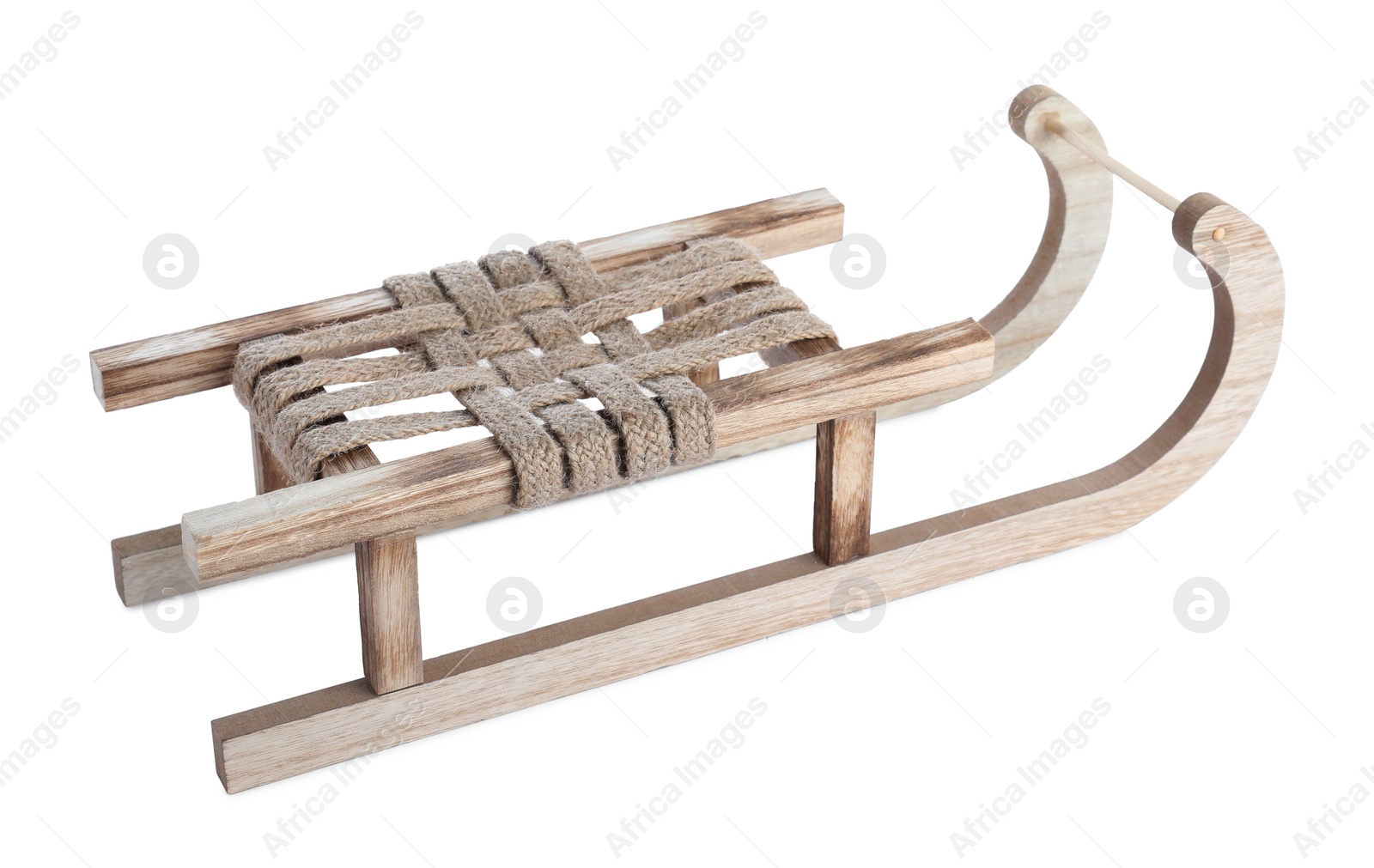 Photo of Wooden sleigh isolated on white. Christmas holiday decor