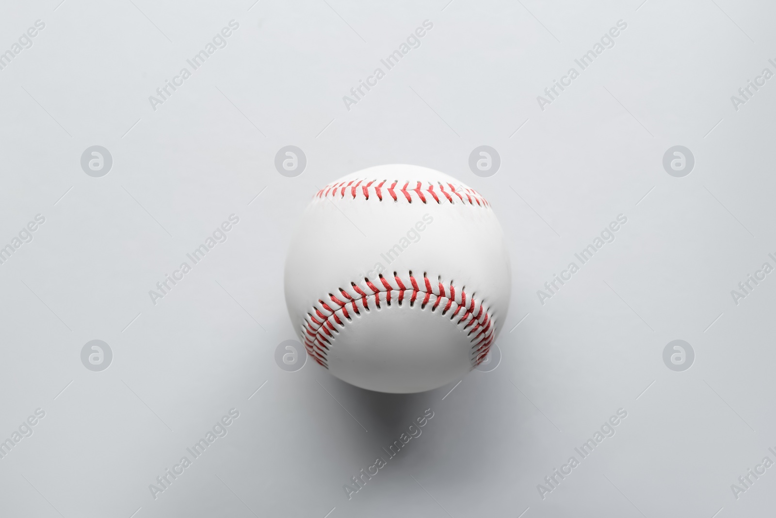 Photo of Baseball ball on white background, top view. Sports game