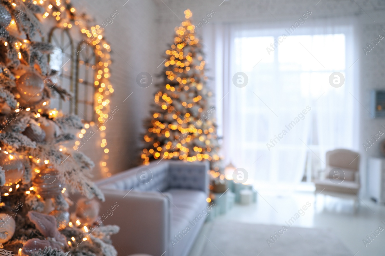 Photo of Blurred view of Christmas living room interior