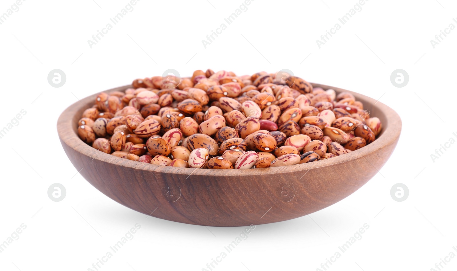 Photo of Wooden bowl with raw kidney beans isolated on white