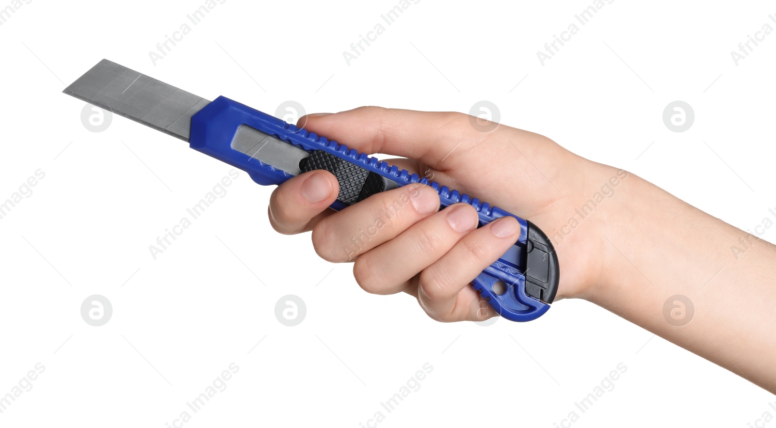 Photo of Woman holding utility knife on white background, closeup