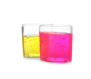 Photo of Colorful slimes in plastic containers isolated on white. Antistress toy