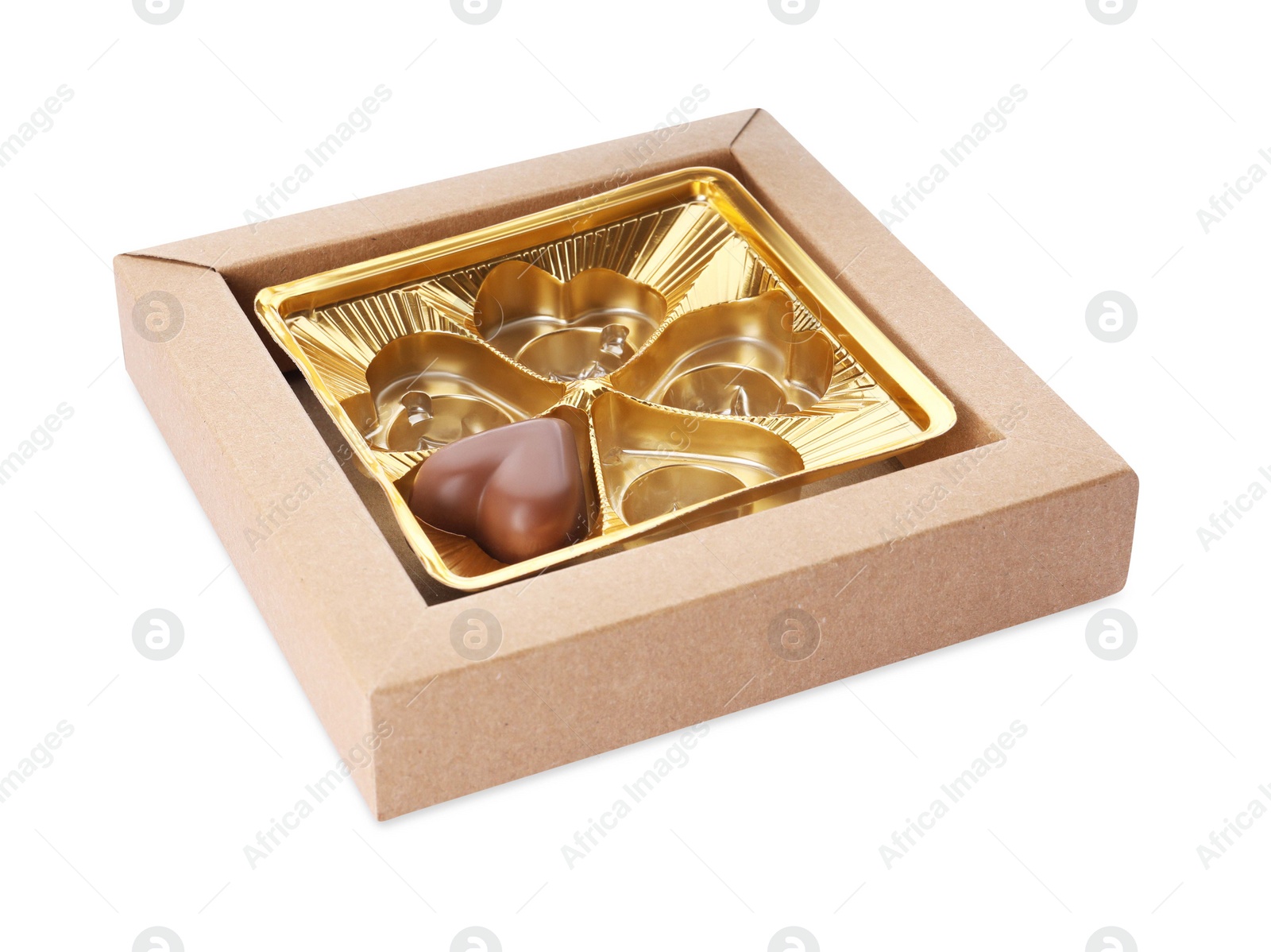 Photo of Partially empty box of chocolate candies isolated on white