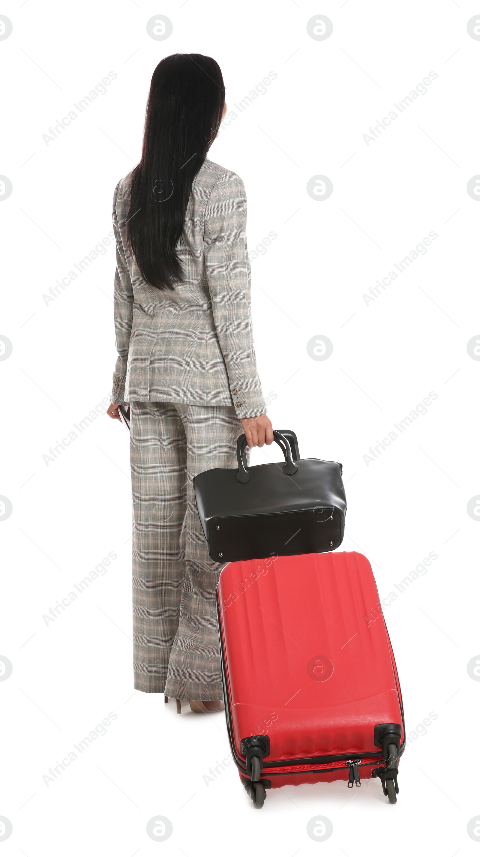 Photo of Businesswoman with suitcase and bag for vacation trip on white background. Summer travelling