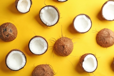 Coconut pattern on color background, flat lay