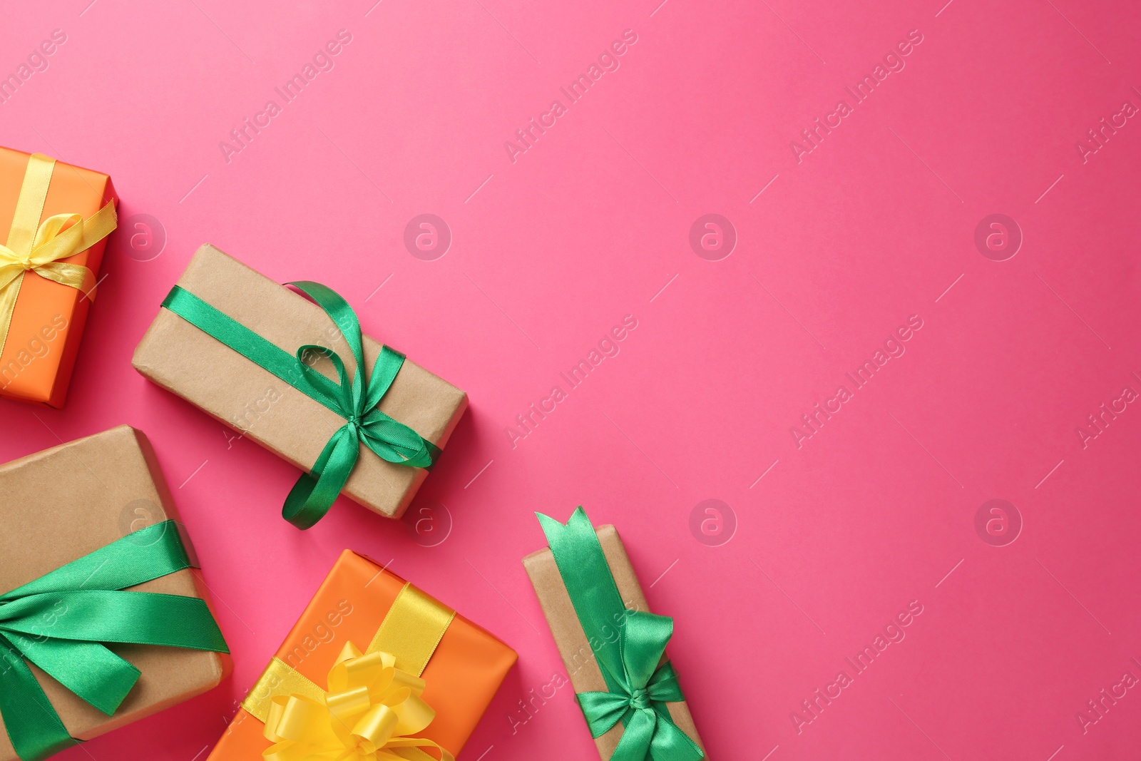 Photo of Many gift boxes on pink background, flat lay. Space for text