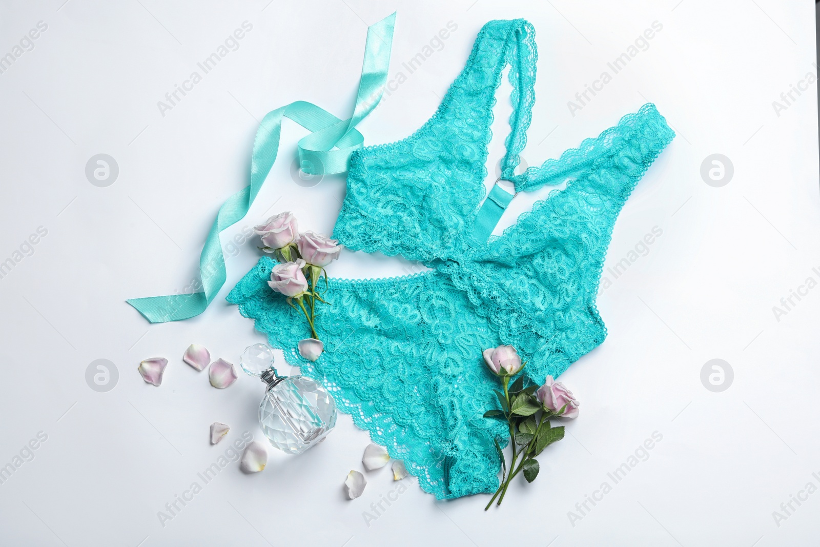 Photo of Composition with elegant women's underwear on light background, flat lay