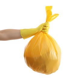 Photo of Woman holding plastic bag full of garbage on white background, closeup