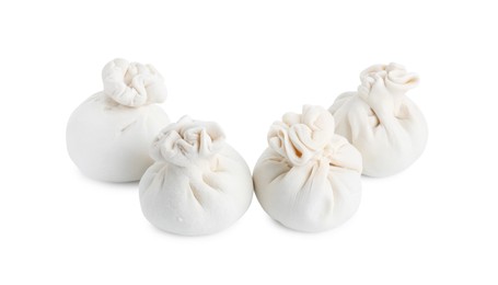 Uncooked khinkali (dumplings) isolated on white. Georgian cuisine