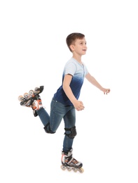 Photo of Little boy with inline roller skates on white background