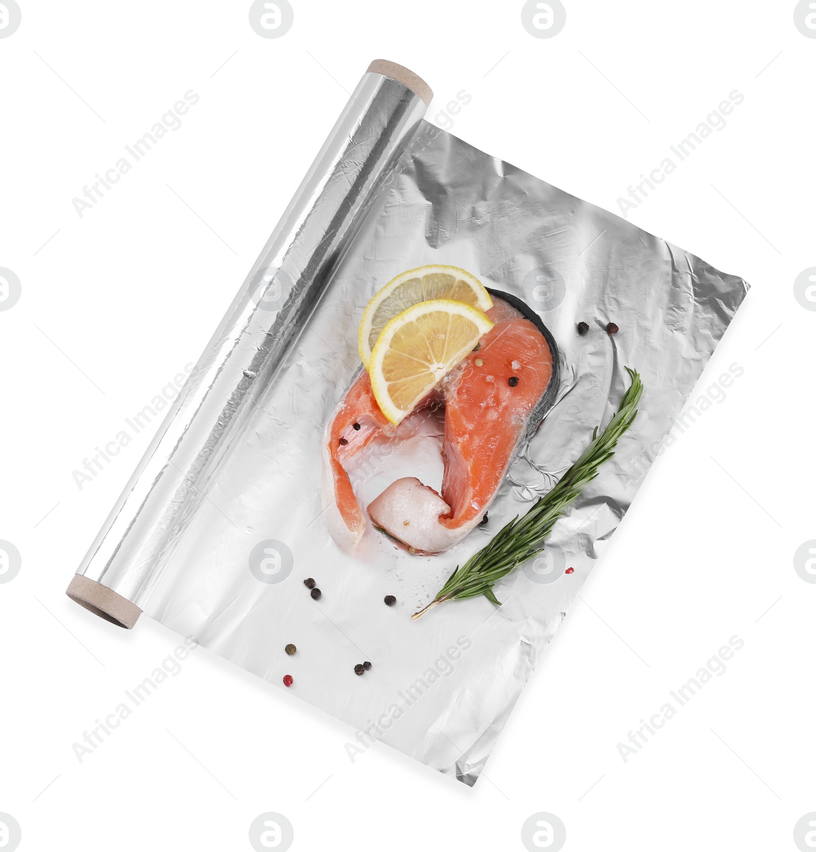 Photo of Aluminum foil with raw salmon, lemon slices, rosemary and spices isolated on white, top view