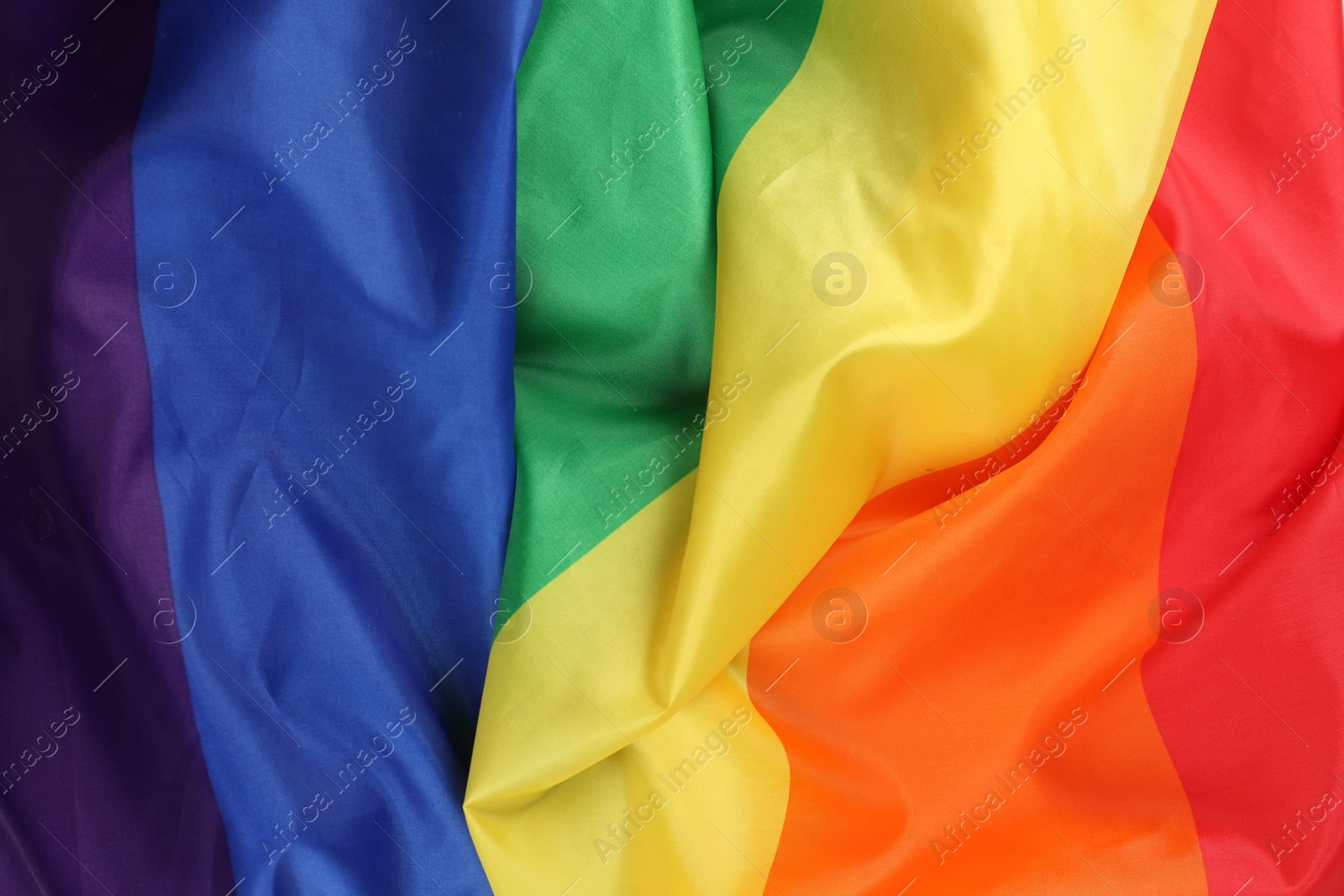 Photo of Rainbow LGBT flag as background, top view