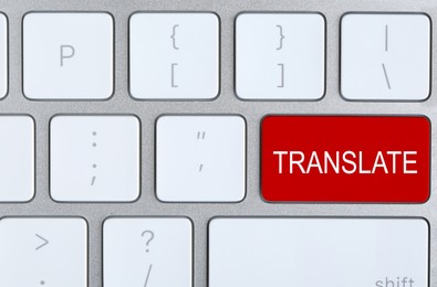 Image of Red button with word TRANSLATE on computer keyboard, top view