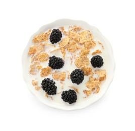 Photo of Bowl with flakes, milk and berries on white background. Healthy grains and cereals