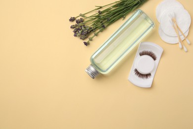 Photo of Flat lay composition with makeup remover and lavender on yellow background. Space for text
