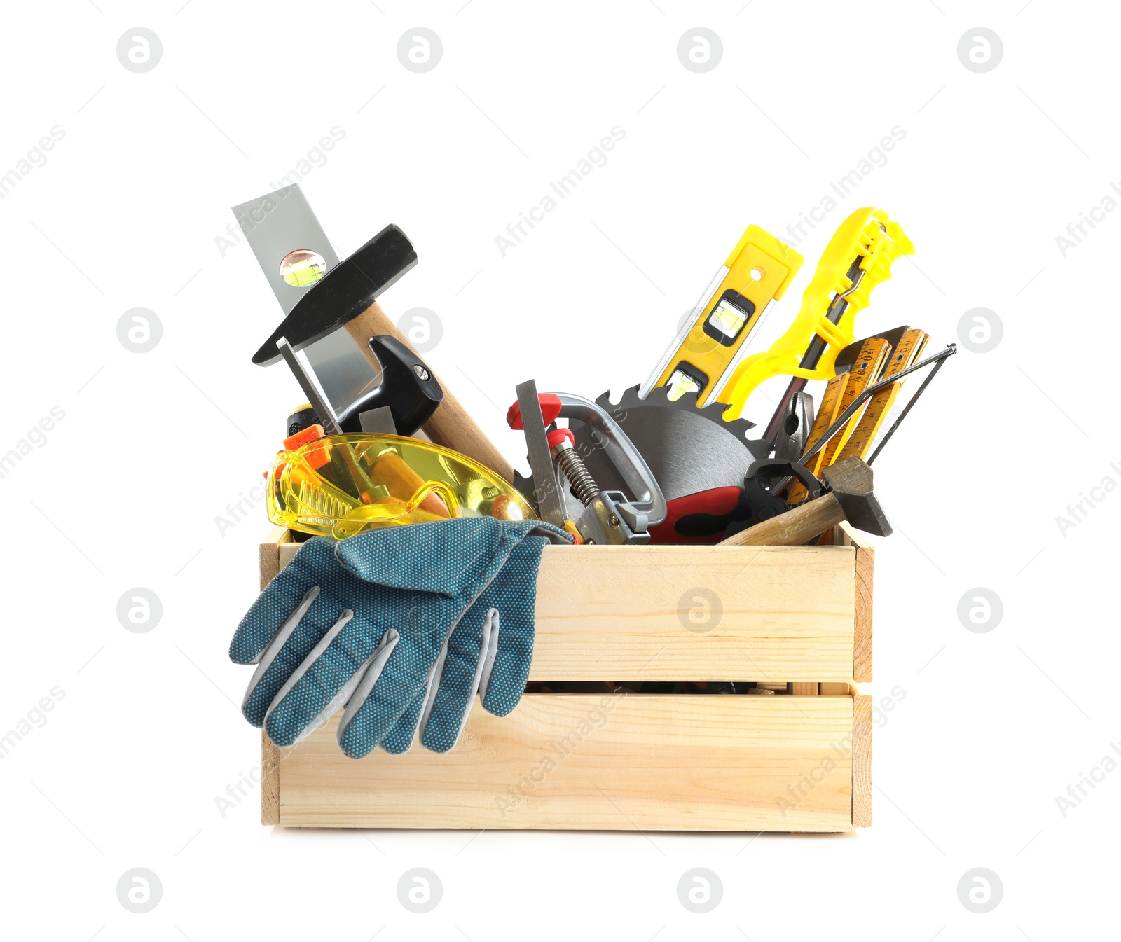 Photo of Wooden crate with different carpenter's tools isolated on white