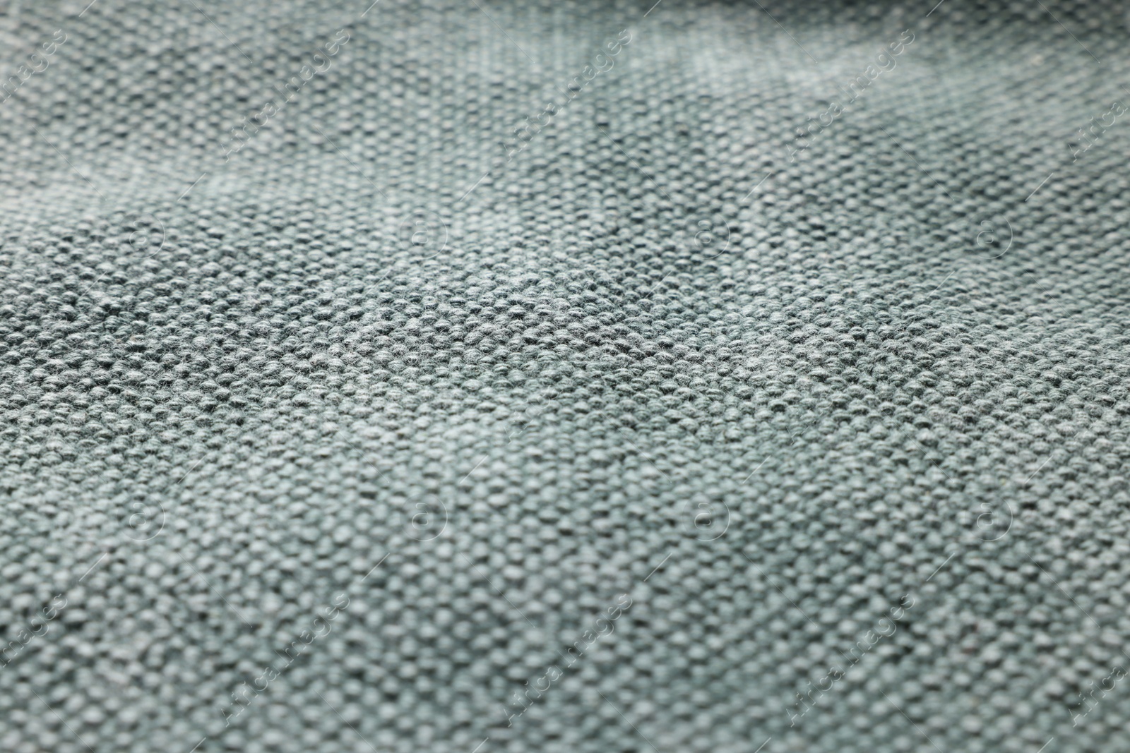 Photo of Texture of grey fabric as background, closeup