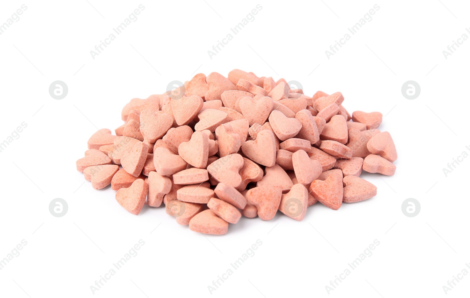 Photo of Many heart shaped vitamins for pets isolated on white