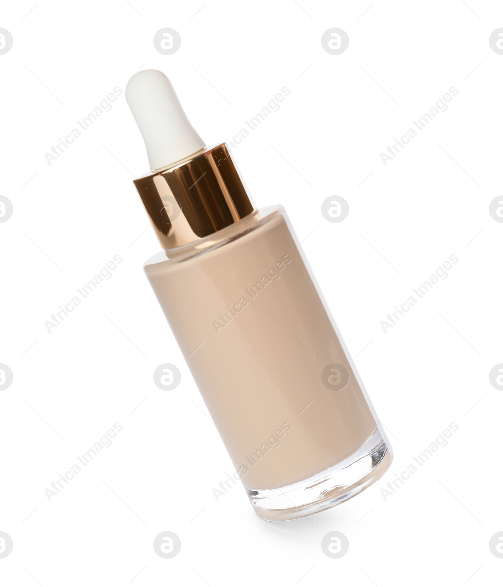 Photo of Bottle of skin foundation isolated on white. Makeup product