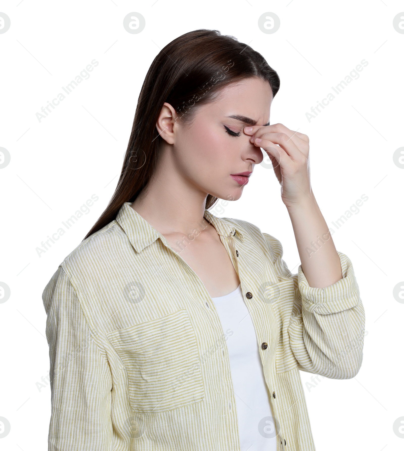 Photo of Young woman suffering from headache on white background